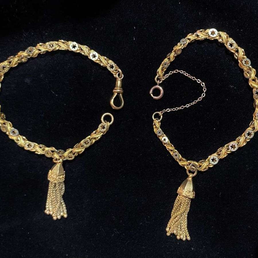 A Pair Of Gold Bracelets